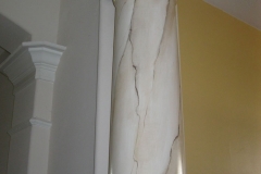 Faux marble column.